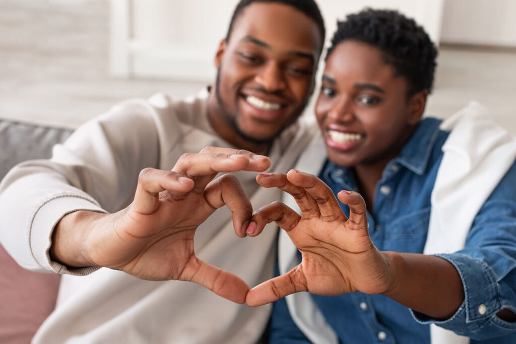 portrait-of-african-american-couple-making-heart-s-2025-03-18-18-14-00-utc (1)